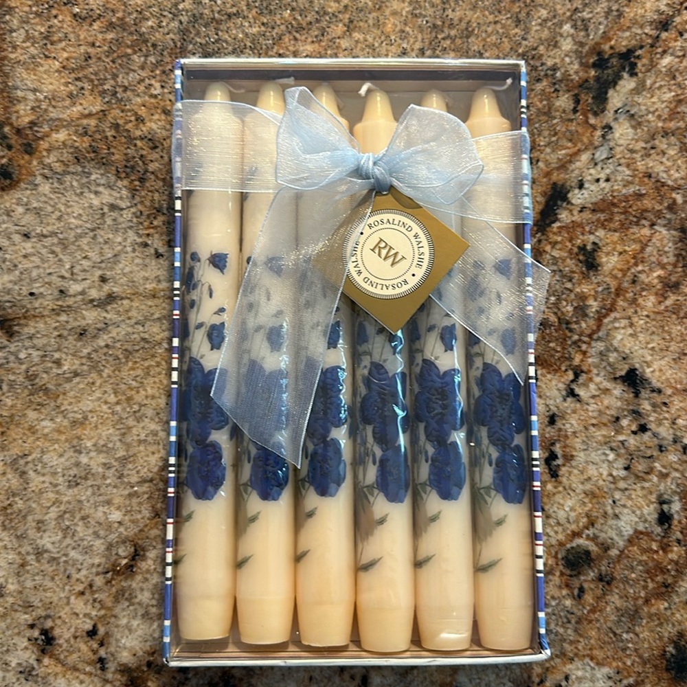 6 Rosalind Walshe cream colored candles adorned with blue flower appliqués